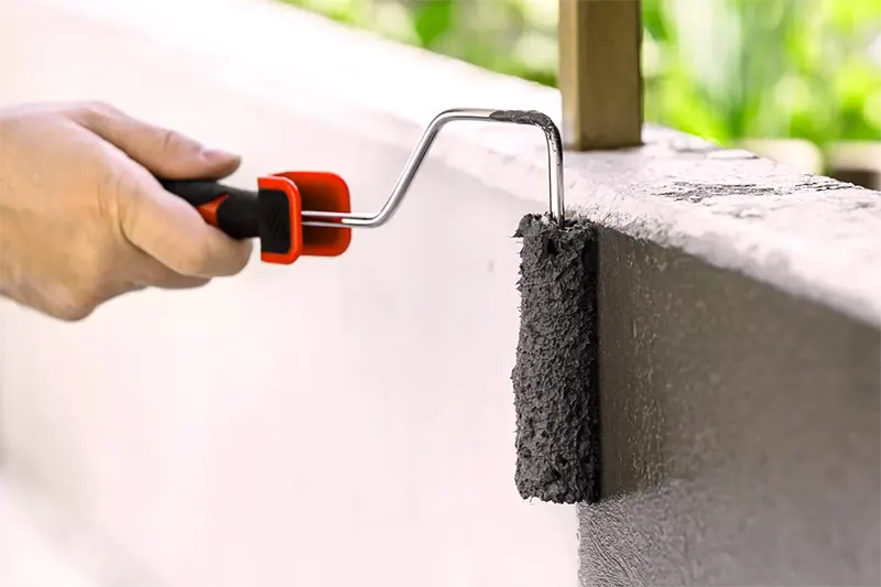 How do you apply cement paint